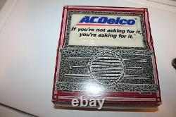 Vintage Chevrolet key holder & AC DELCO Radio nos