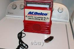 Vintage Chevrolet key holder & AC DELCO Radio nos