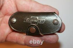 Vintage Chevrolet key holder & AC DELCO Radio nos